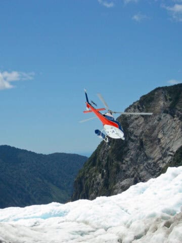 Helicopter departing Franz Josef Glacier.