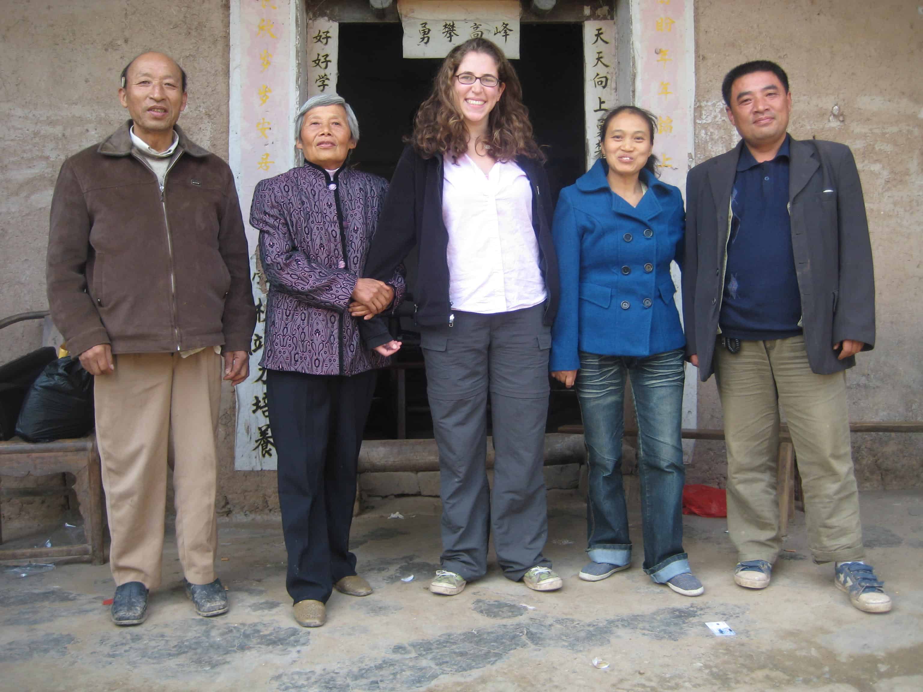 Laura Visiting the home of microfinance clients in China-- I look like a giant in this country, don't I?