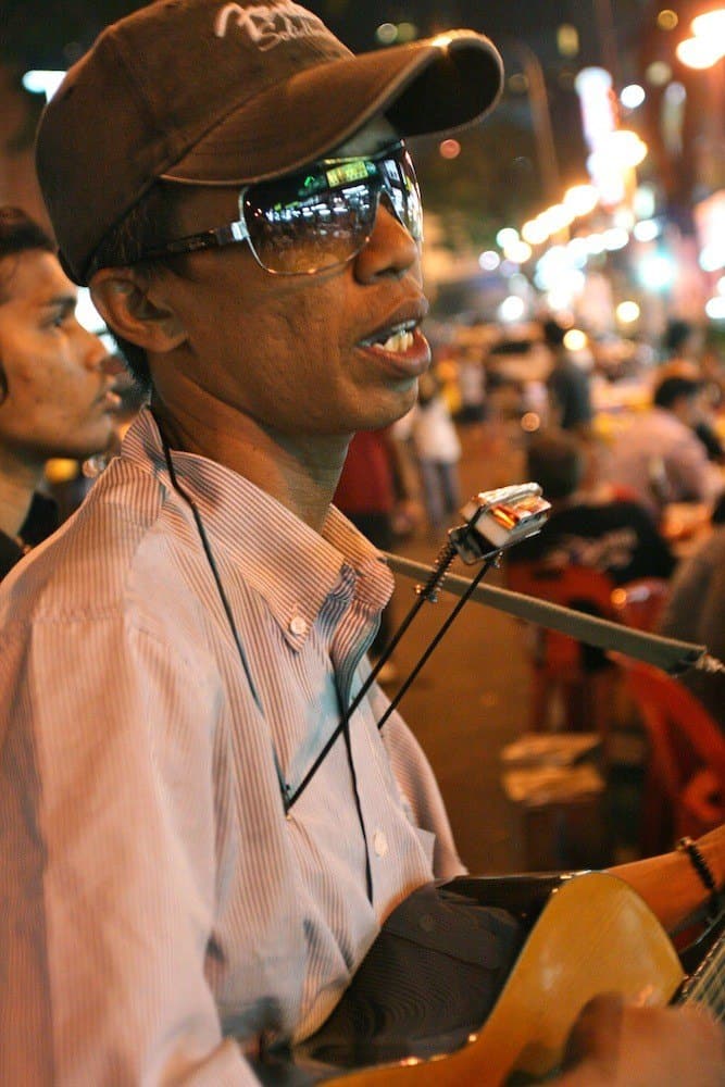 Street musician at Jl Pedaling. Street musician at Jl Pedaling.