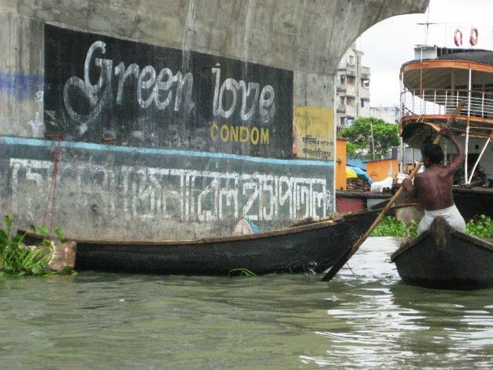 An advertisement under a bridge.