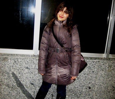 Soaked. Soaked and clueless. Waiting for the train in Genova.