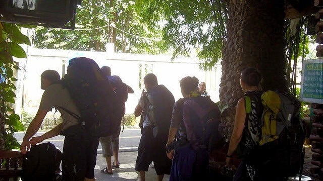 backpackers on move