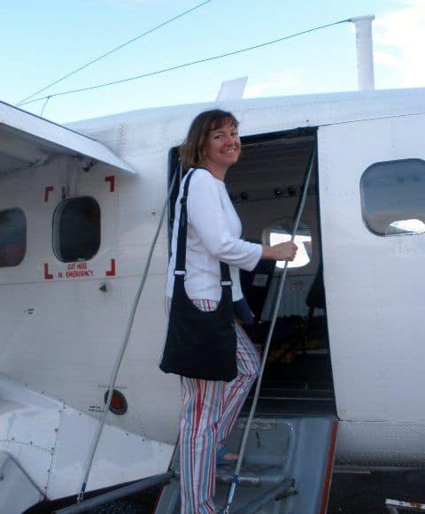 The author (Elaine) The author (Elaine) boarding a small airplane