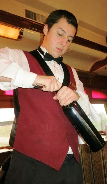 Opening the wine Opening the wine