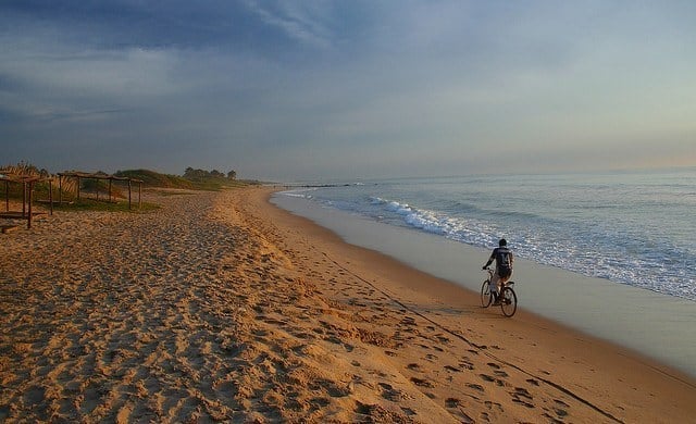 Cyclist in Gunjur, Gambia (photo: Mishimoto).