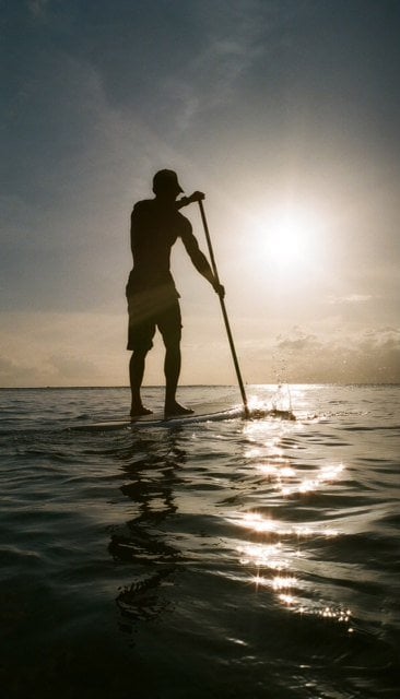 Tiki Man SUP sunset vertical Tiki Man SUP sunset vertical