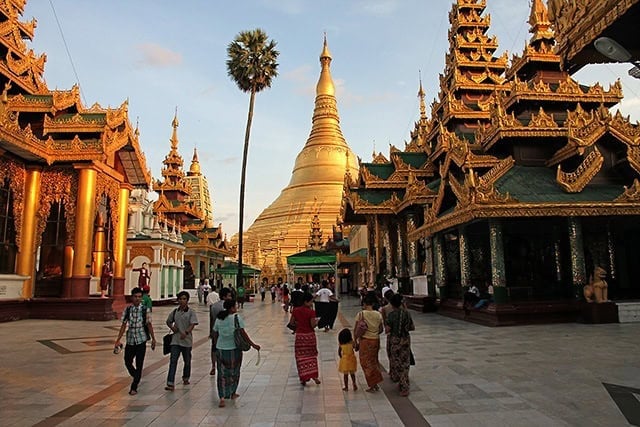 In Yangon be sure to visit the Shwedagon Pagoda around sunset