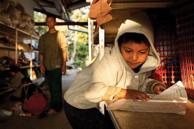 A child studies at the Akha Training Centre in Mae Suai, Thailand (photo: RIBI Image Library)