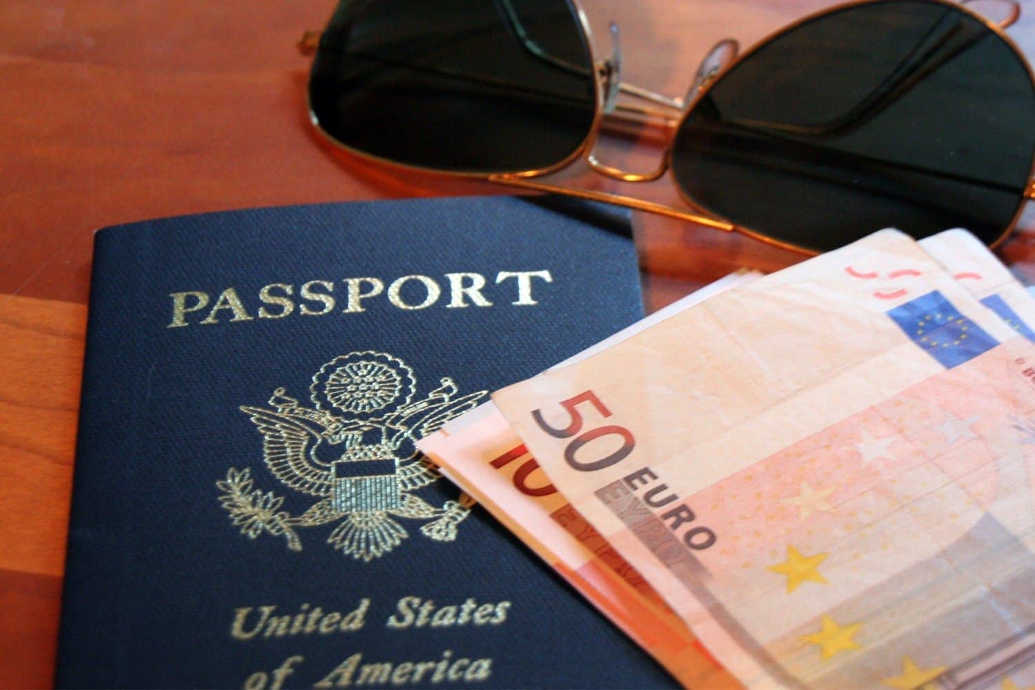 Essentials for moving overseas - passport, sunglasses, cash euros. (photo: Mike)