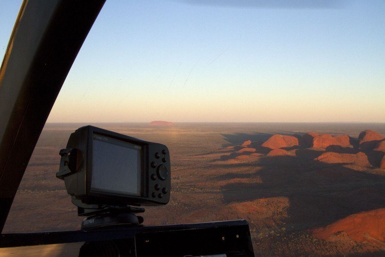 Taking a helicopter ride is one alternative to climbing Uluru.