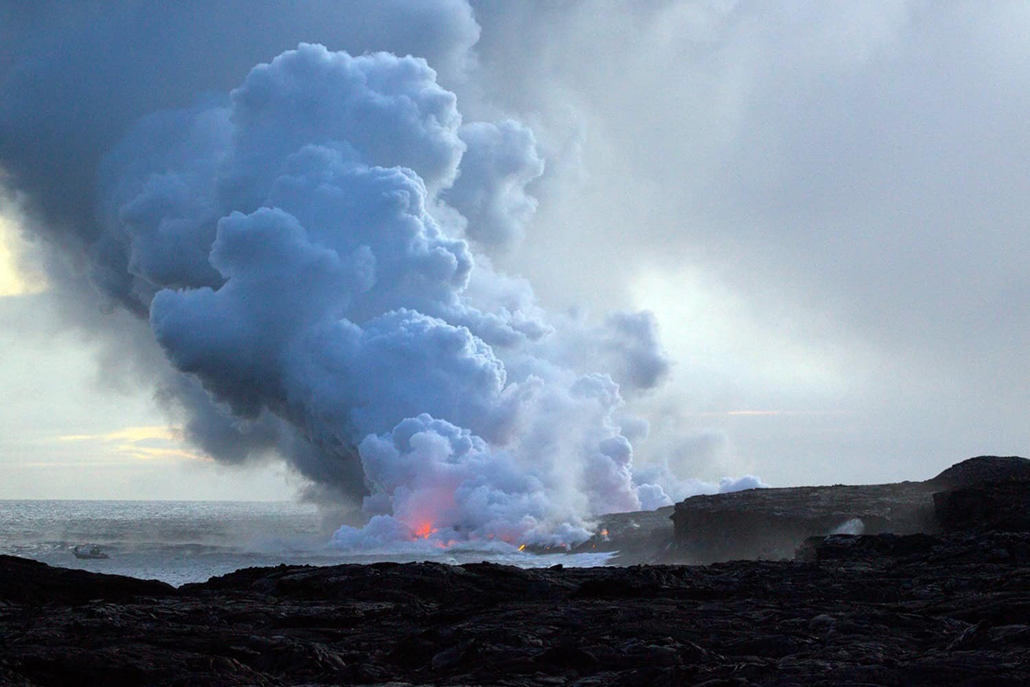 Enjoy the endless flow of lava into the sea at the Hawai'i Volcanoes National Park. (Credit: Matt MacGillivray)
