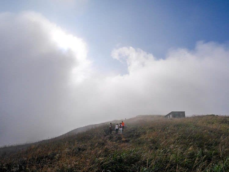 sunset peak lantau island hong kong laugh travel eat