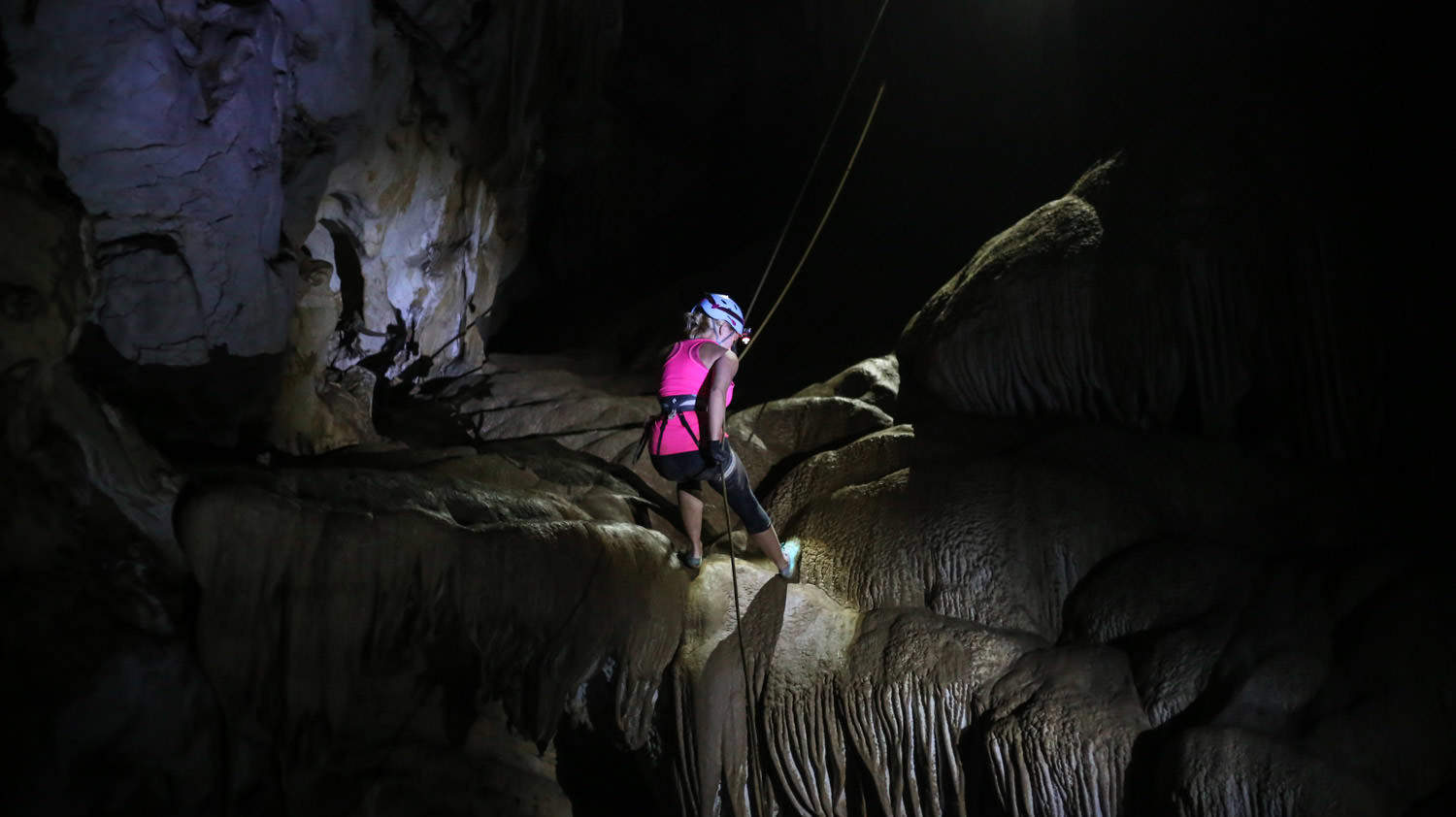 Rappelling in Kolem Chen Cave
