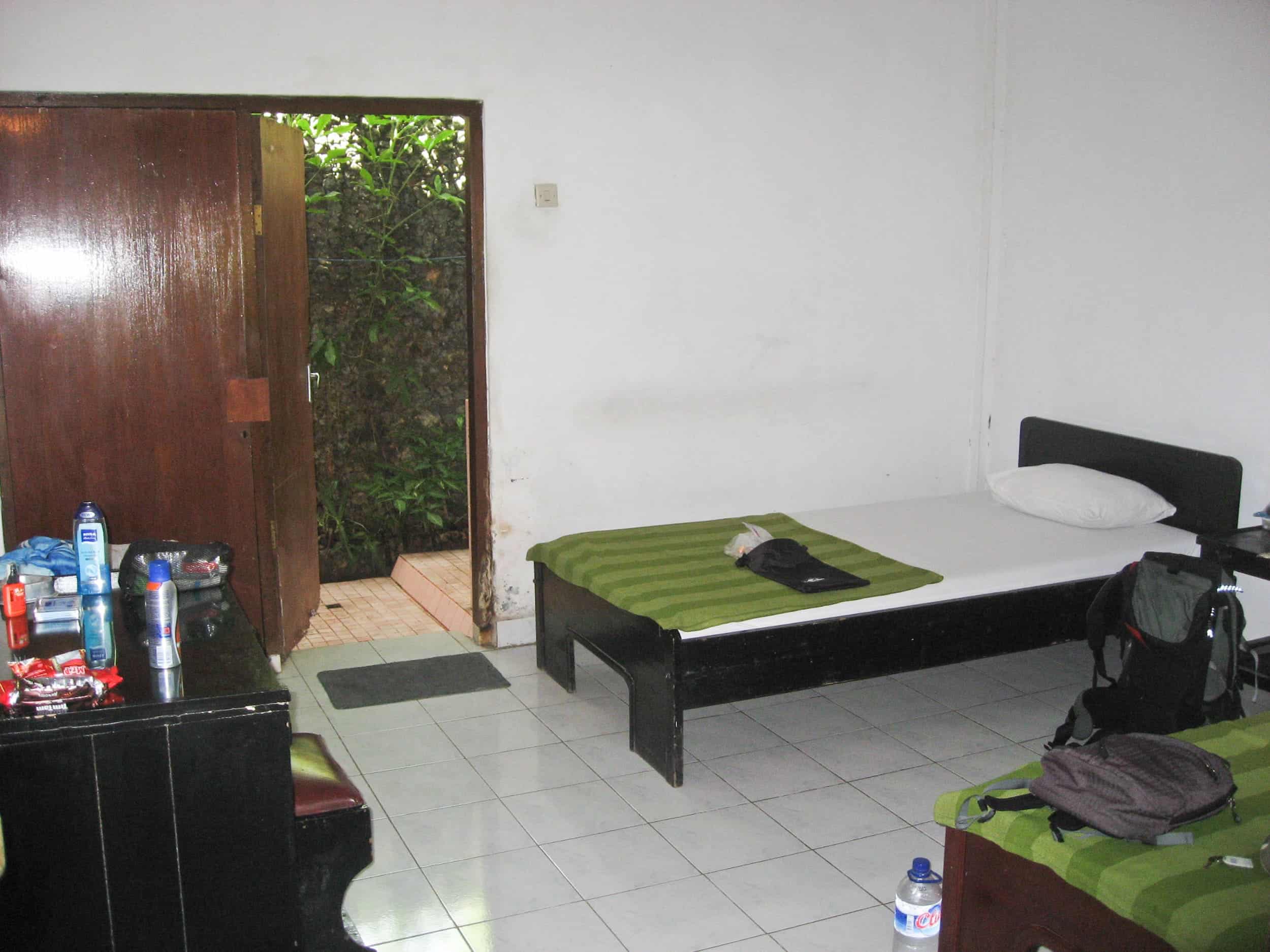 Basic double room in Bali. Staying in cheap places is a way to keep the cost of travel in Indonesia low. (photo: Dave Lee)