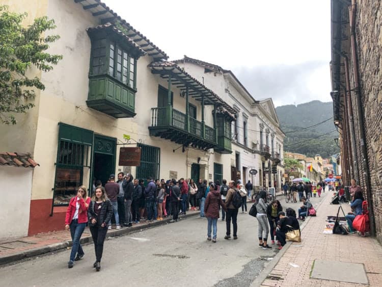 A line forms outside La Puerta Falsa, one of the city's oldest restaurants