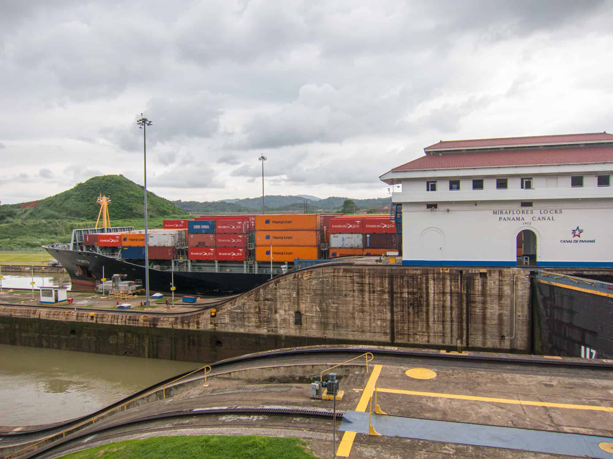 A cargo ship passes through Miraflores Locks, Panama Canal