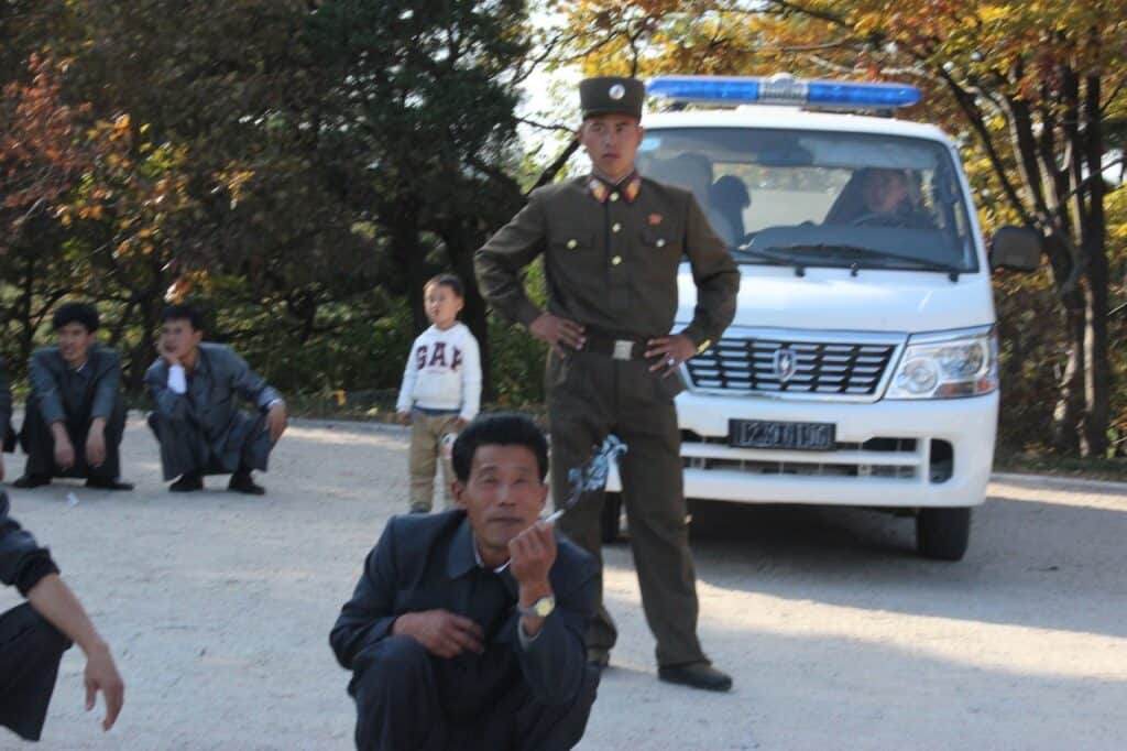 People sitting Kaesong City, DPRK (2013)