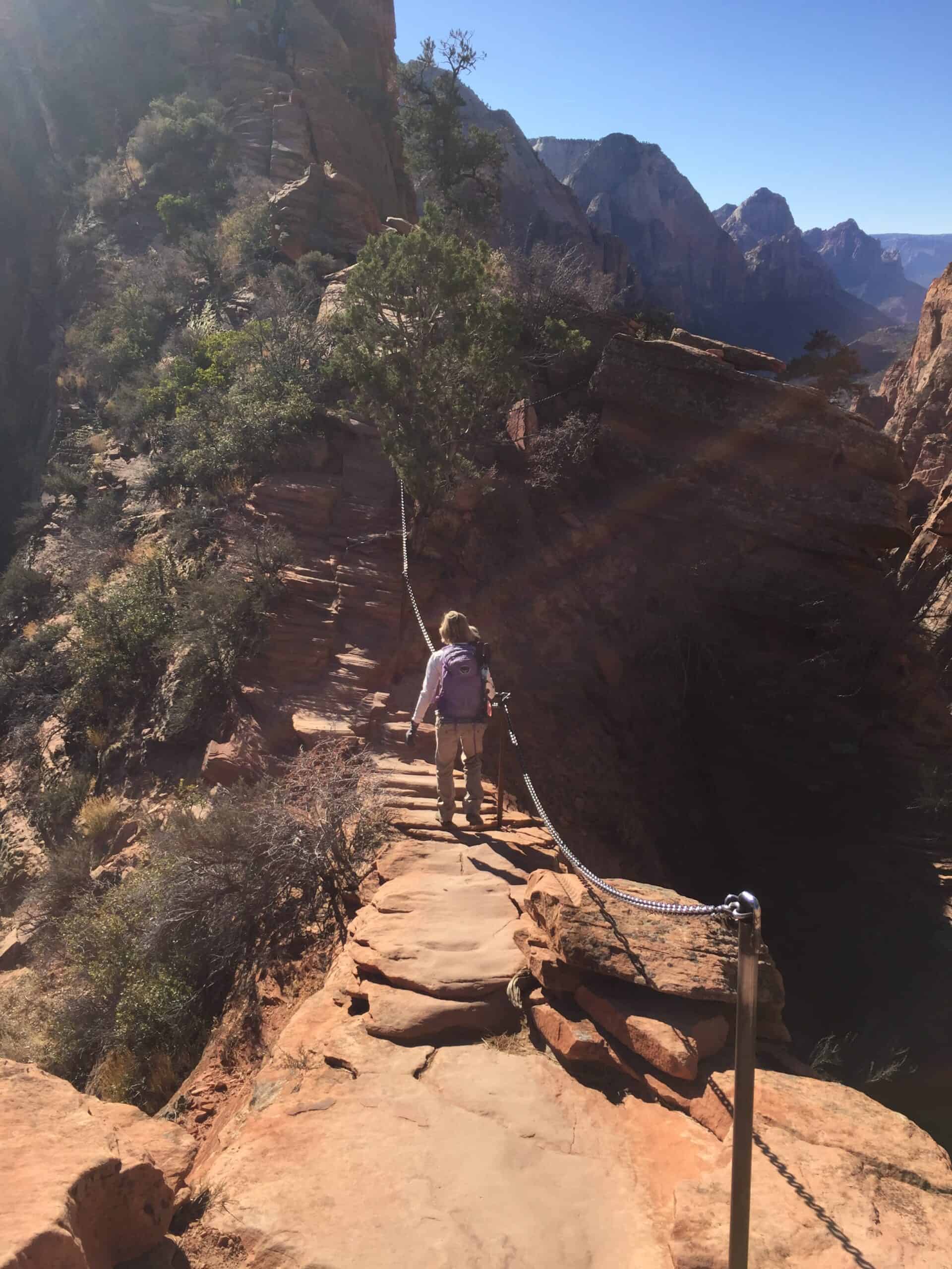 A chain helps guide and steady hikers in Zion.
