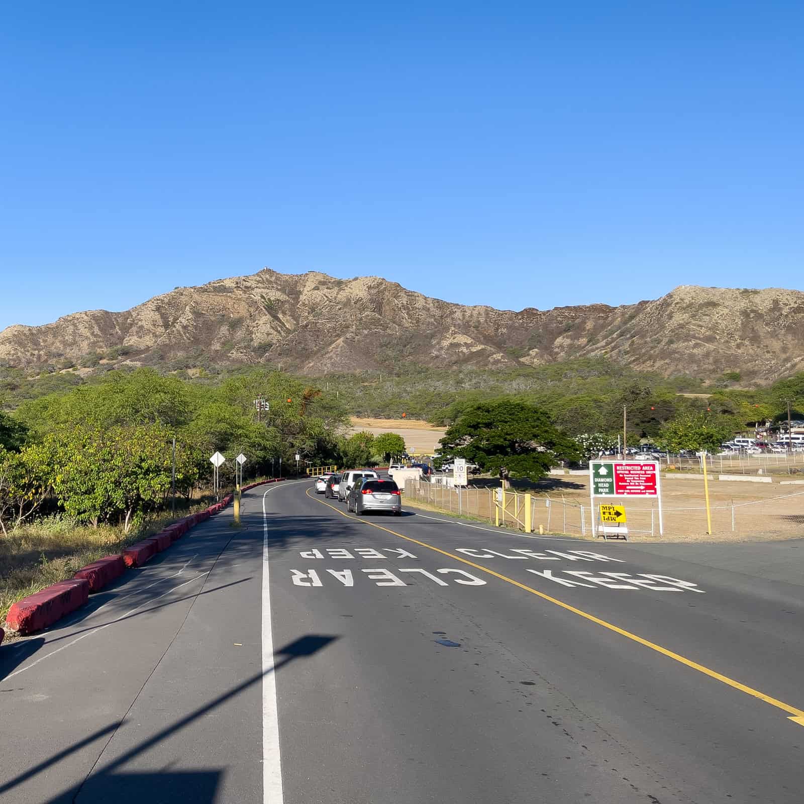 Inside Diamond Head crater, the summit is in the distance.
