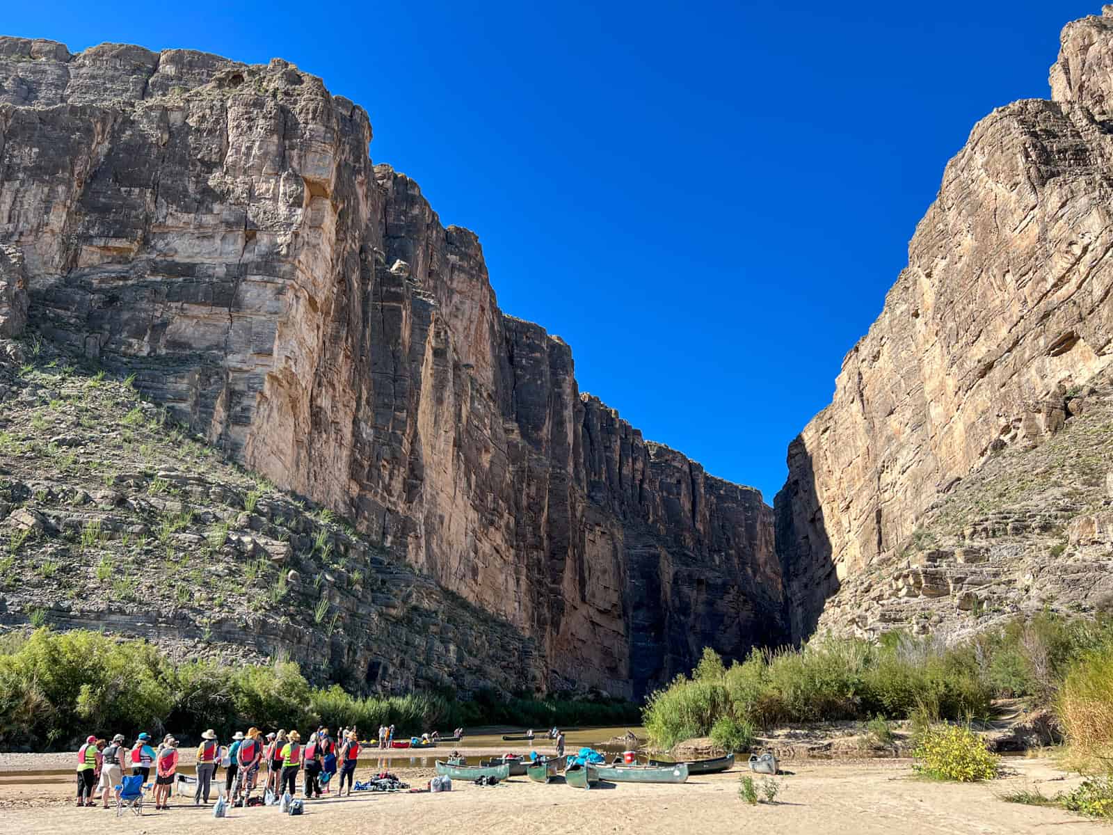 Kayakers prepare to paddle the Rio Grande River through the Santa Elena Canyon