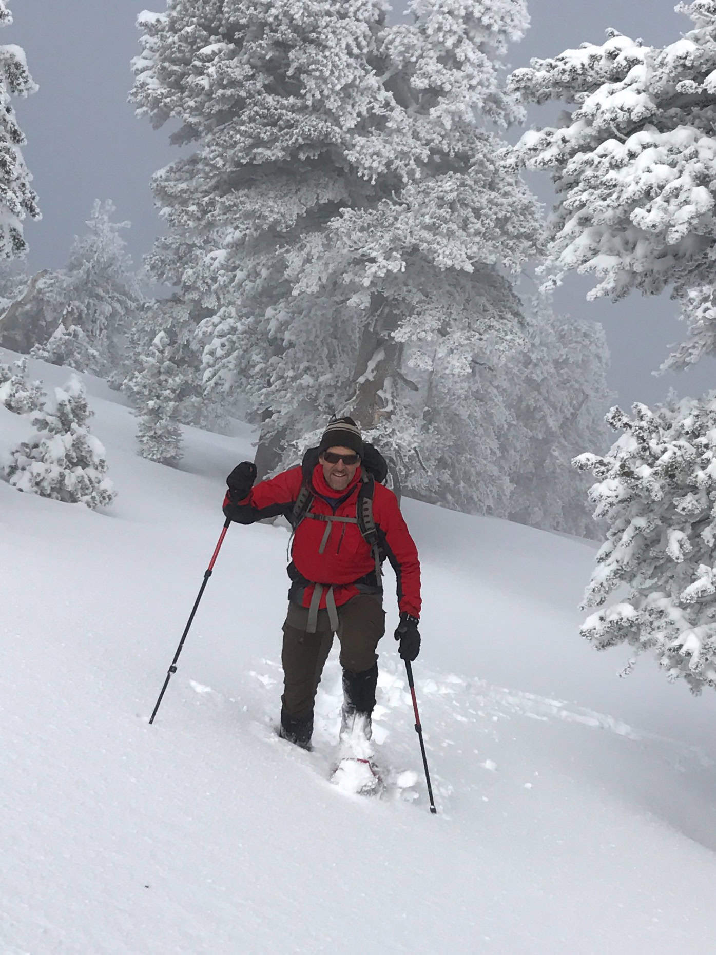 Snowshoeing through deep snow at 10,500 feet on Mount Saint Jacinto in California.