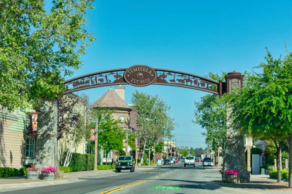The Old Town Temecula gateway depicts themes from western history and welcomes visitors to Temecula Valley Wine Country. (photo: Michael Vi)