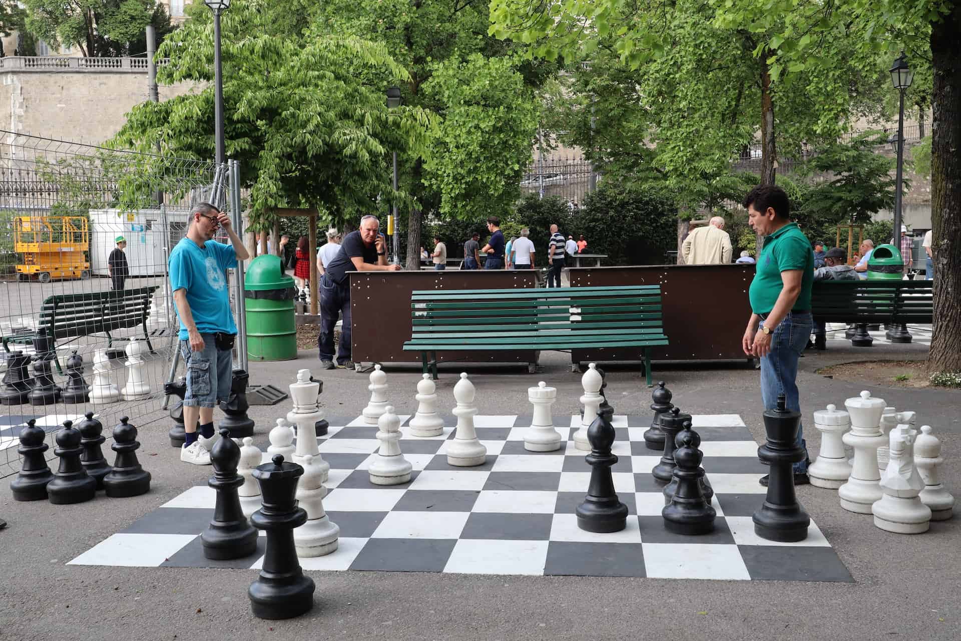 Two men playing chess on the street at Bastion park (photo: Carol Jeng)