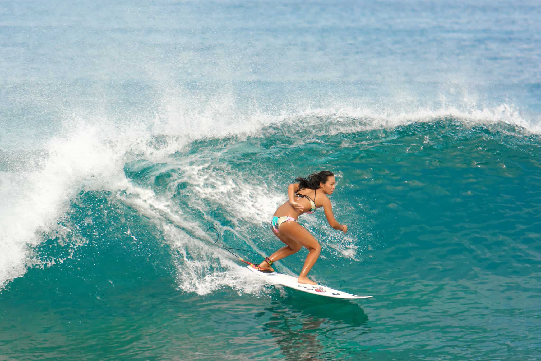 A woman surfing on the North Shore, near Sunset Beach (photo: Daniel Ramirez)