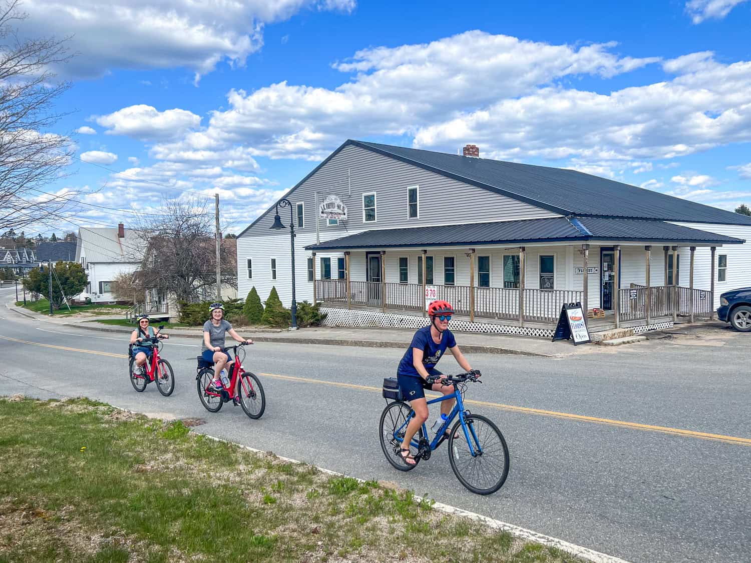 Winter Harbor is a good place to begin and end your cycling trip to the Schoodic Peninsula. Pictured from left: Jules, Jennifer, and Mackenzie.