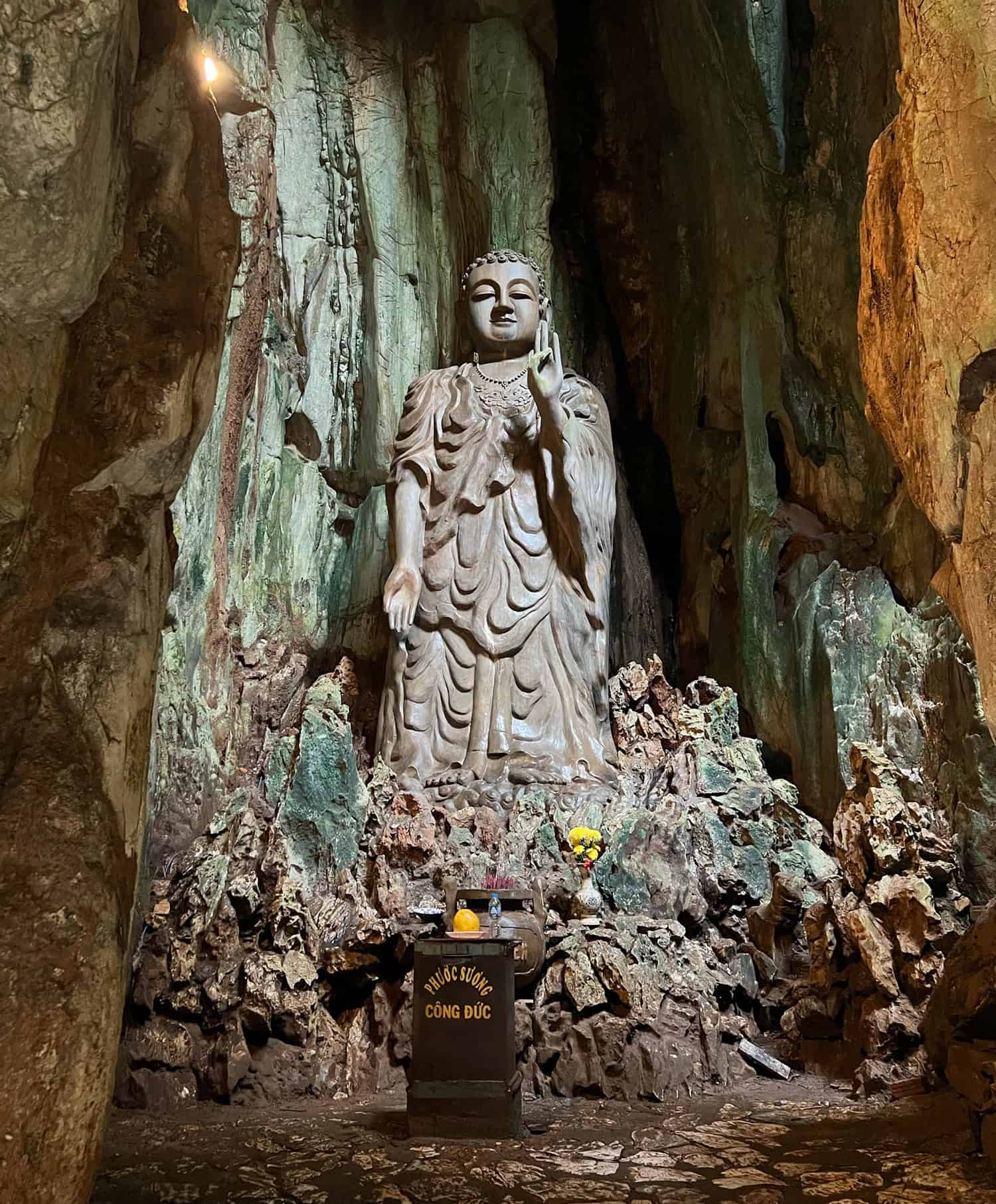 Standing Buddha in Tang Chon Cave (photo by Dave Lee)