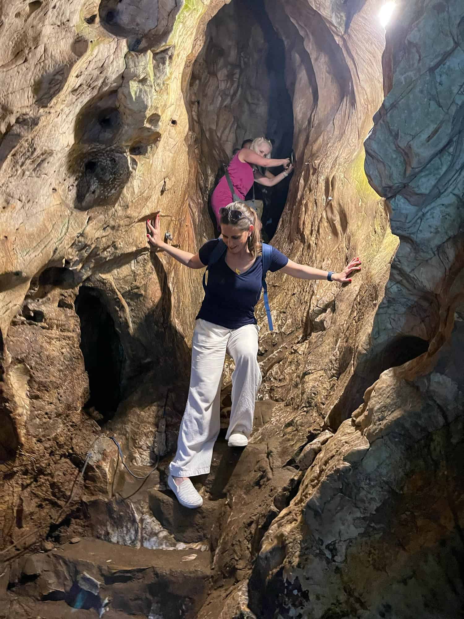 Kel carefully exits Van Thong Cave