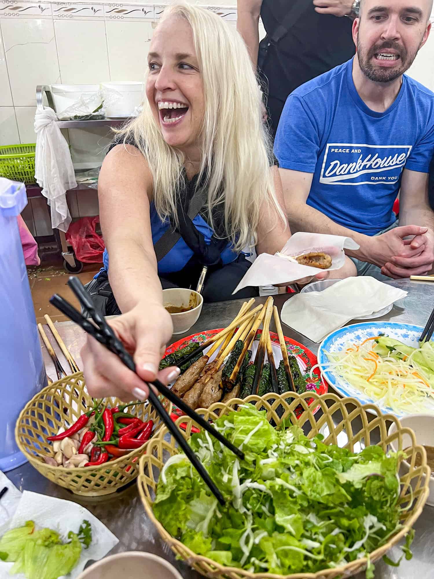 Our friend Laura enjoying the street food tour we did in Da Nang.