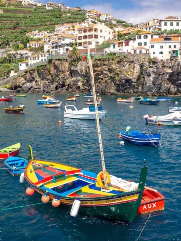 Boats bob in the water off the coast of Camara de Lobos - Madeira, Portugal (photo: Piotr Musiol).