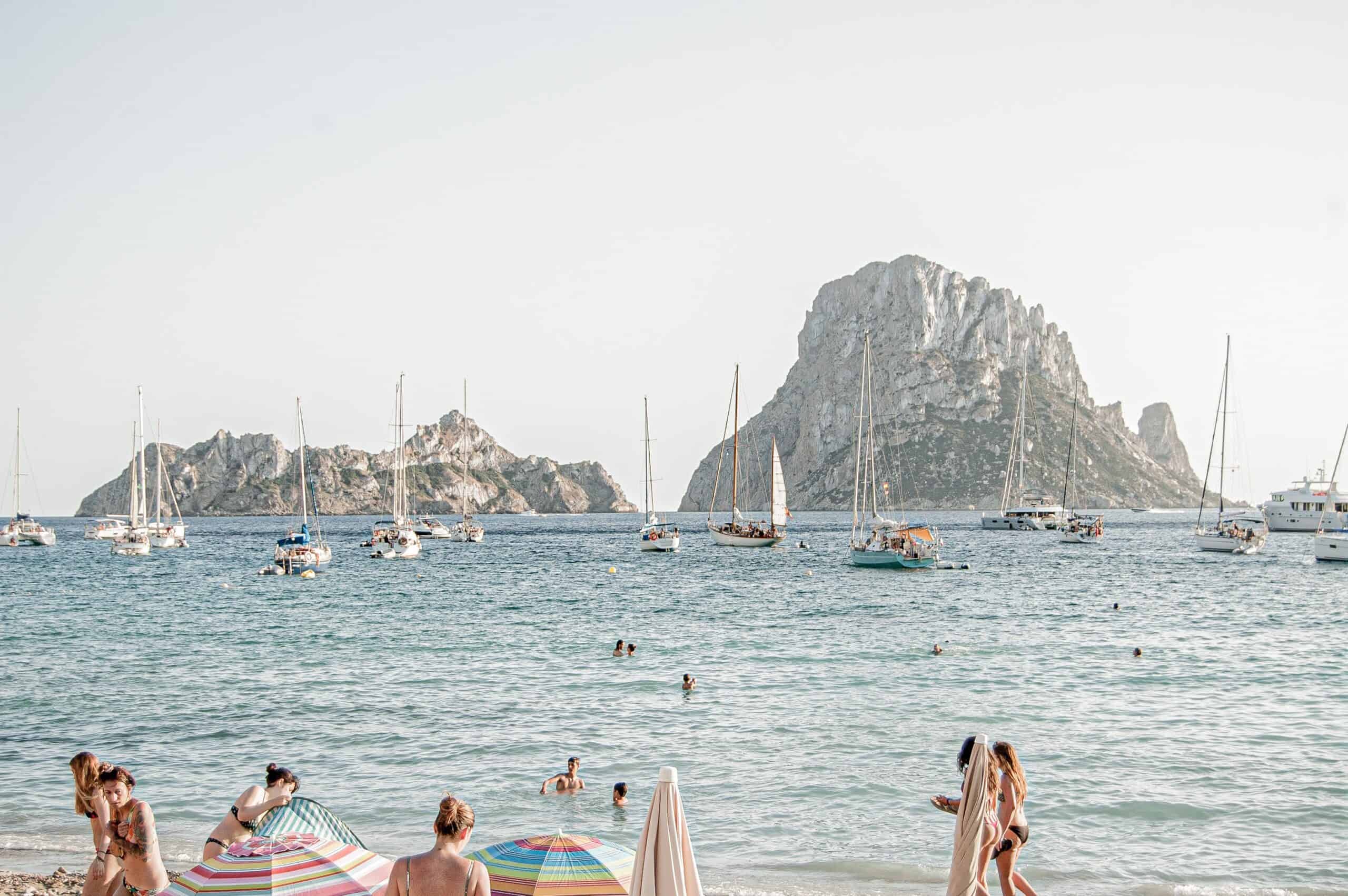 Ibiza beach scenes like these are why it's one of the busiest European islands every summer. (photo: Ferran Feixas via Unsplash)
