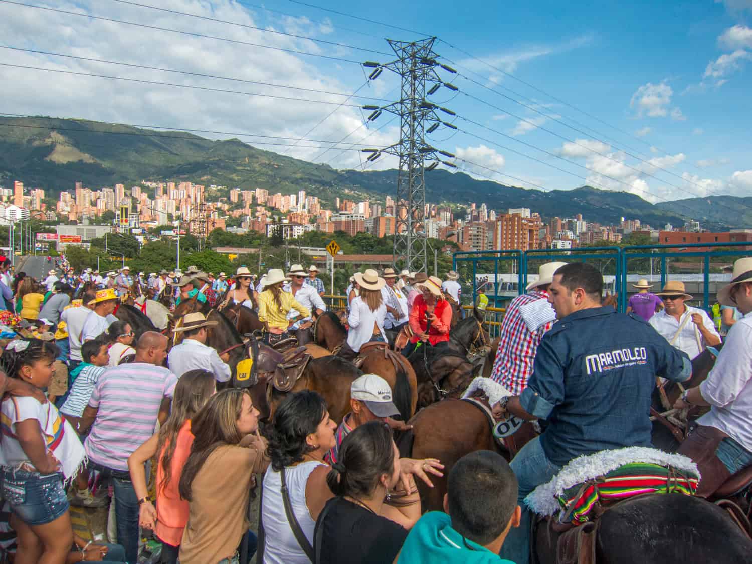 Crowds gather for a horse parade in Medellin.