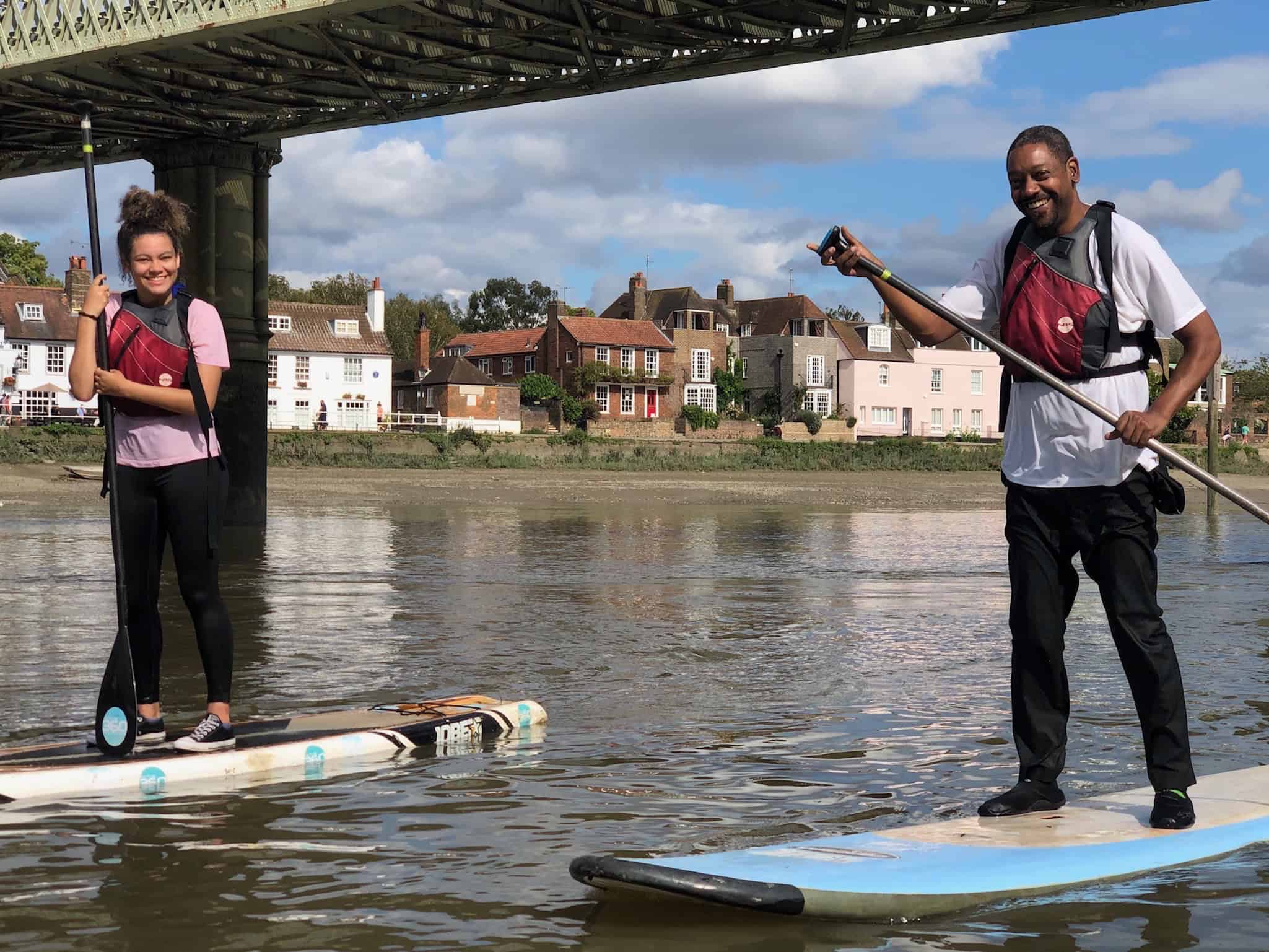 Paddleboarding is one of the best outdoor activites in London. This photo was taken under Kew Bridge. (photo: Active 360)