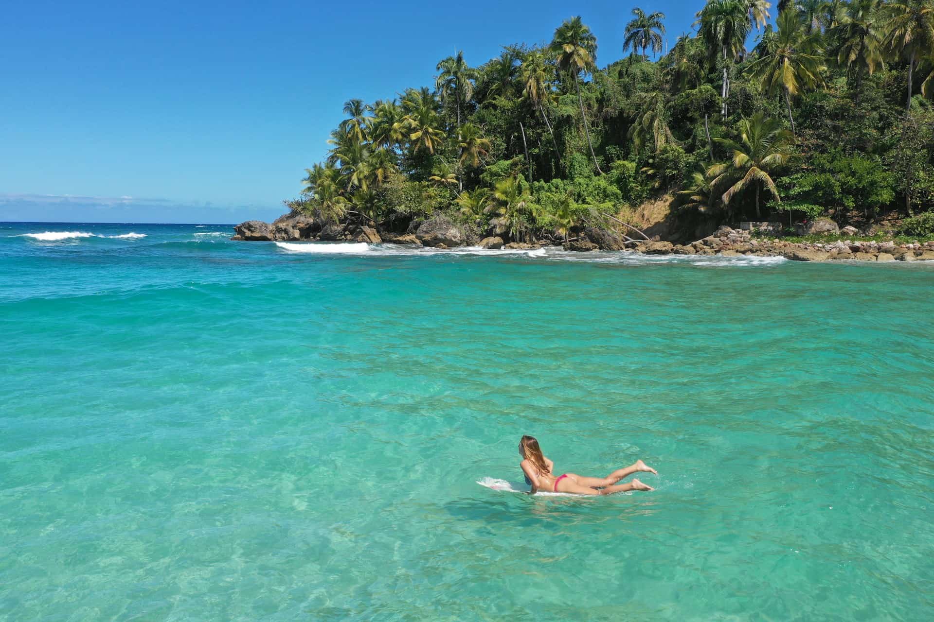 Female surfer in the Dominican Republic (photo: Kevin Wolf)