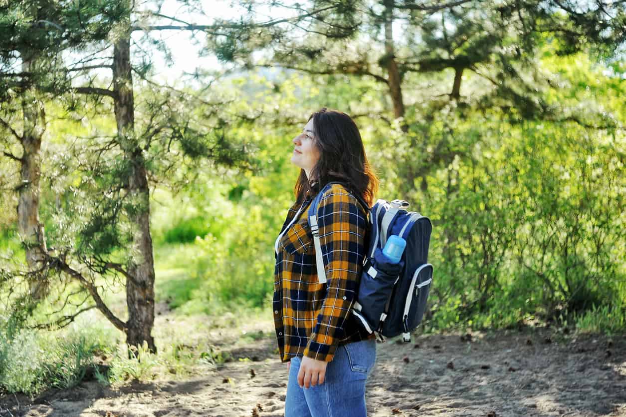 Female hiker in wide leg jeans (photo: iStock)