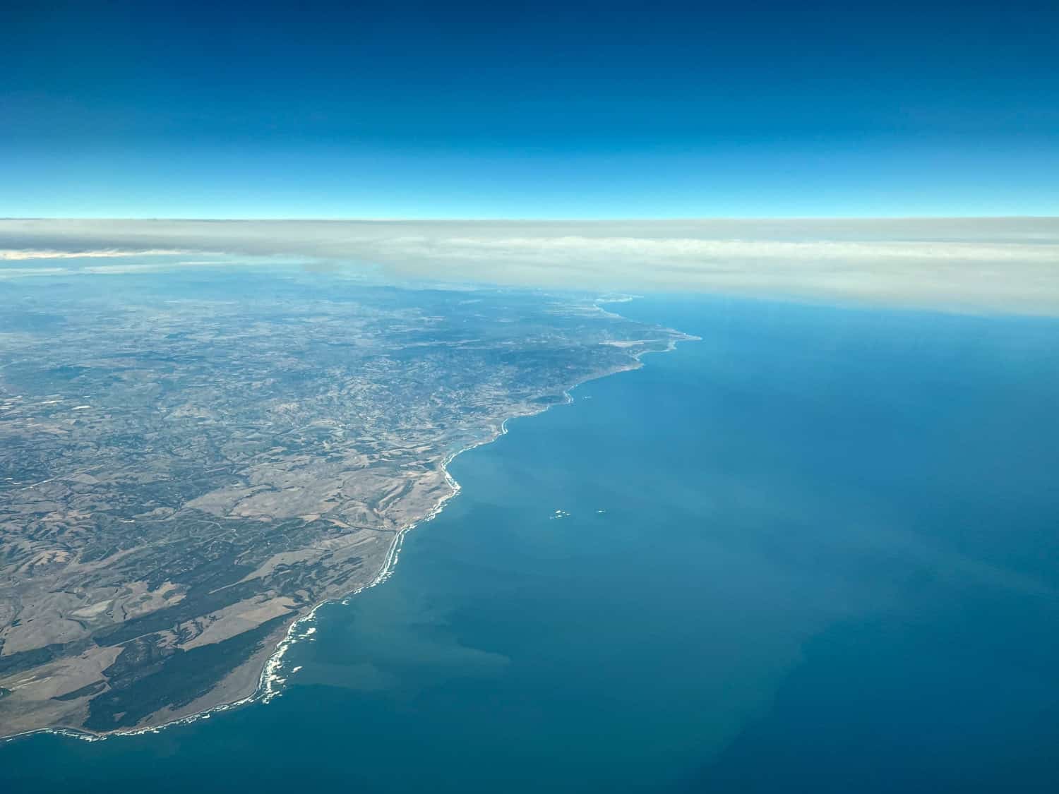 Flying over the Chilean coast en route to Rapa Nui (photo by Kelly Lemons).