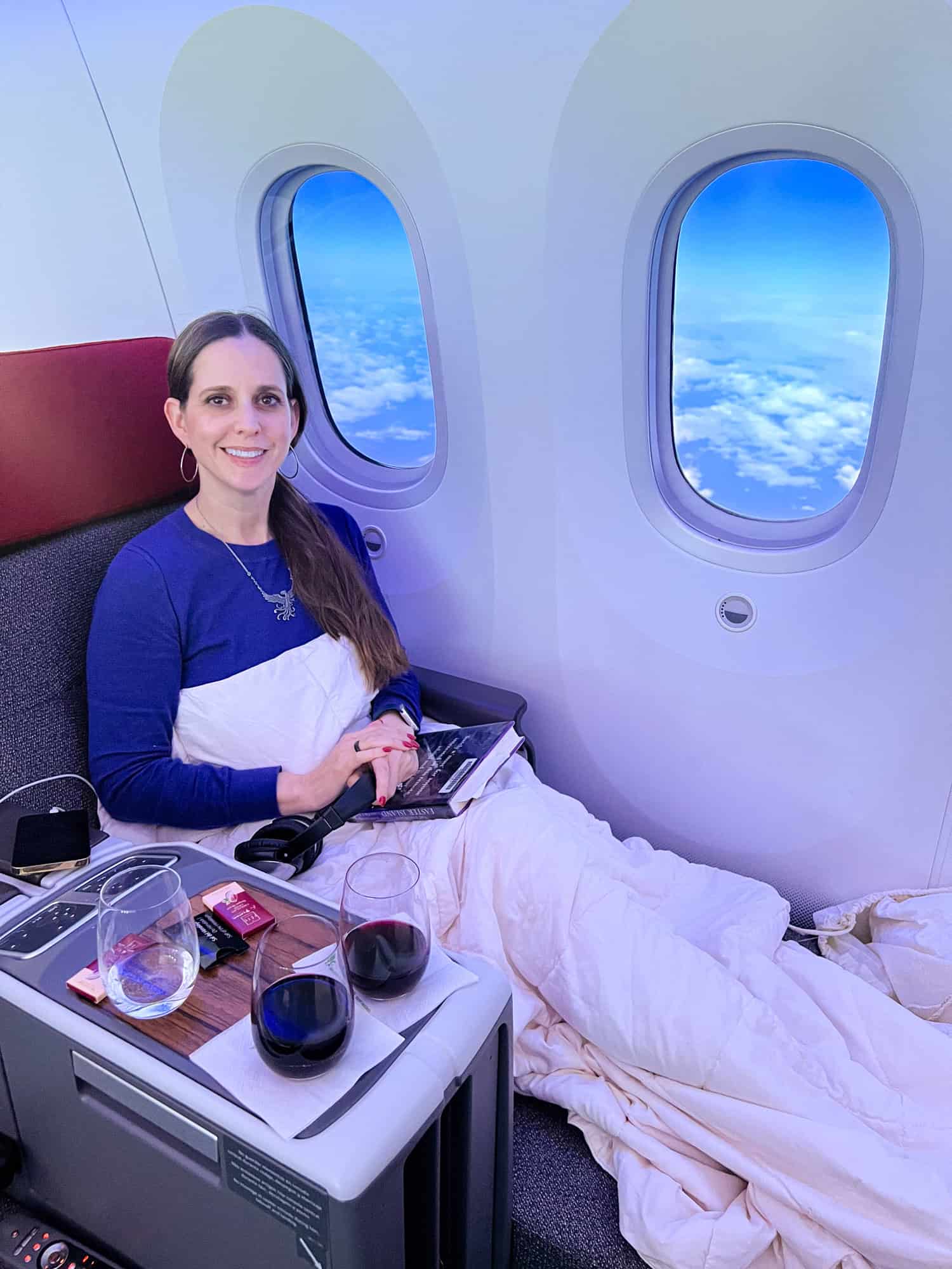 Kel enjoying her Business Class seat.