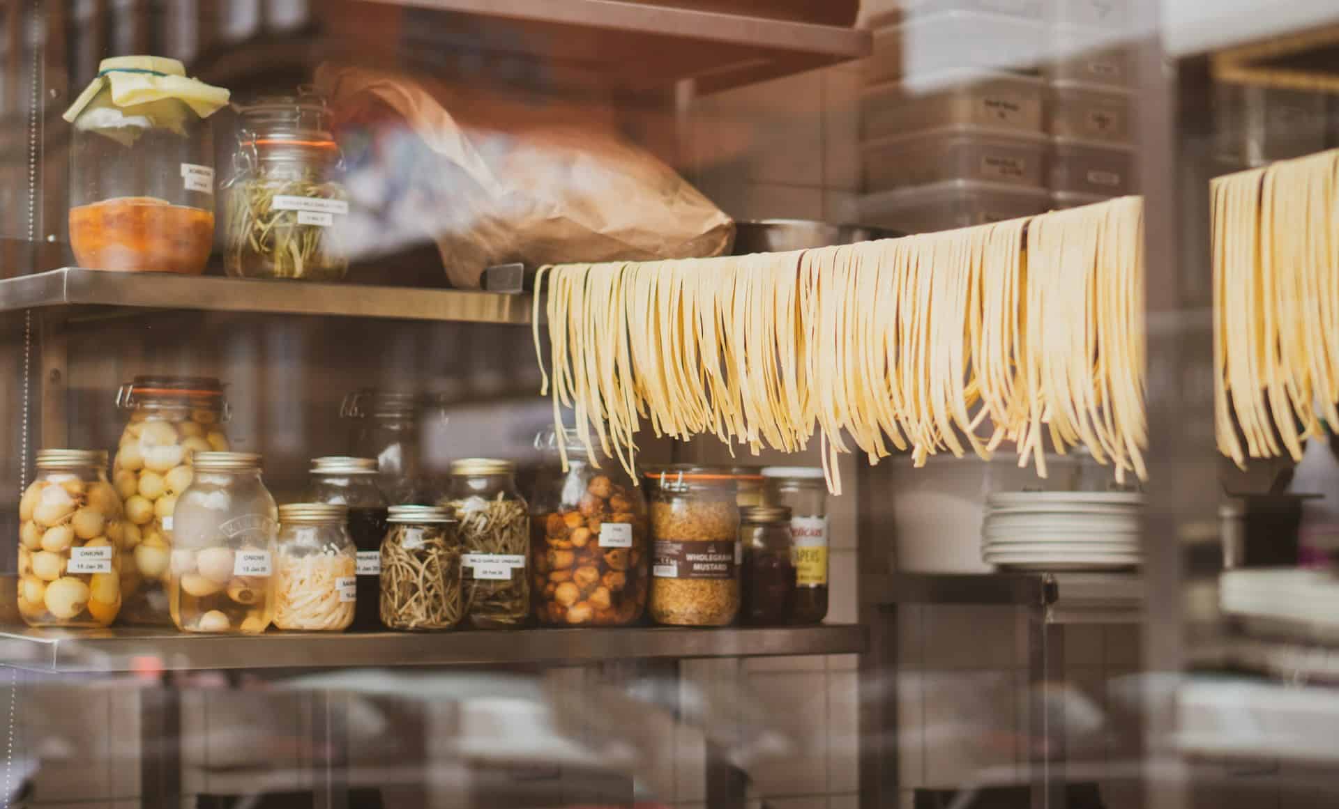 Fresh pasta hangs at a restaurant in Italy (photo: Eilis Garvey).