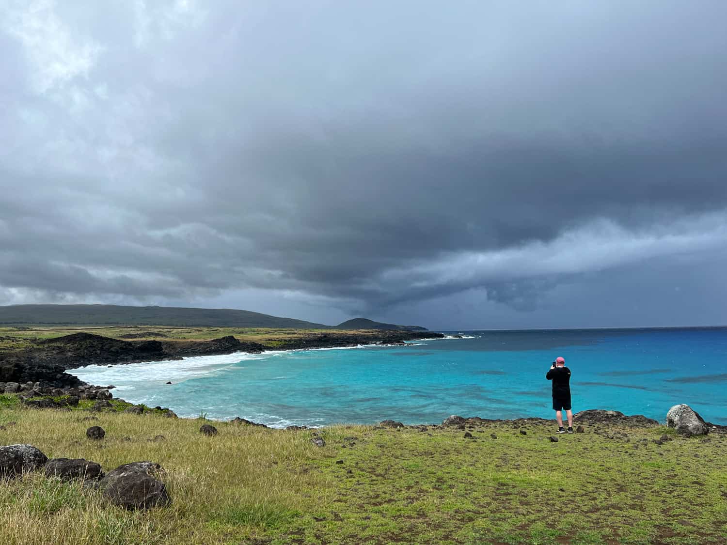 Dave photographs storm clouds while on a break from driving a rental car around Easter Island (photo by Kelly Lemons).