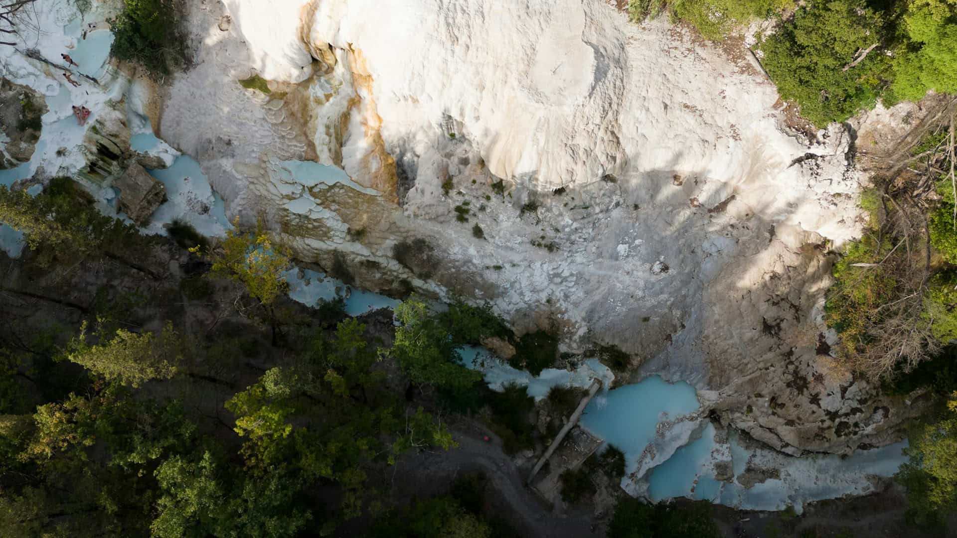 Hot springs at Bagni San Filippo, Italy (photo: Roby Allario, Unsplash).