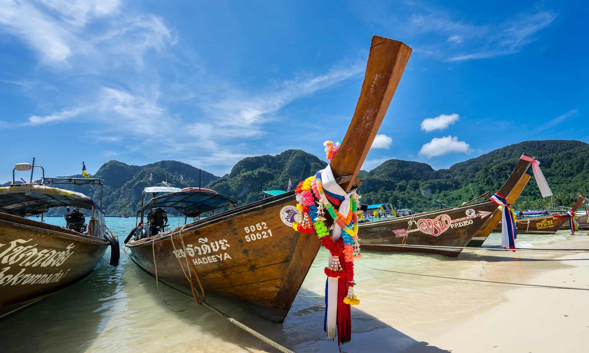 Long tail boats on Koh Phi Phi, a popular December travel destination (photo: Frankie Spontelli).
