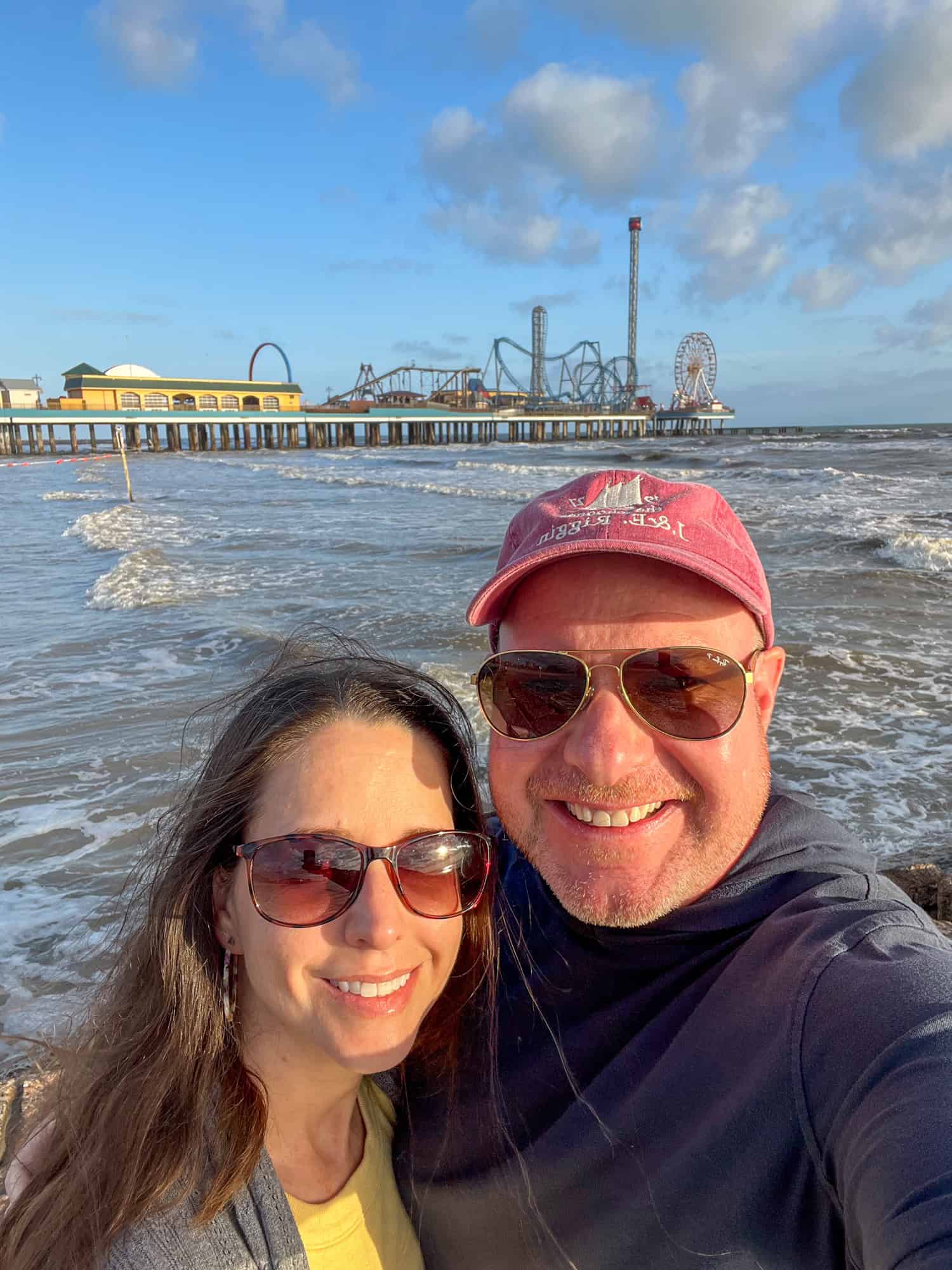 Dave and Kel near the Galveston Pier; this beach trip was one of his favorite travel experiences in 2024.