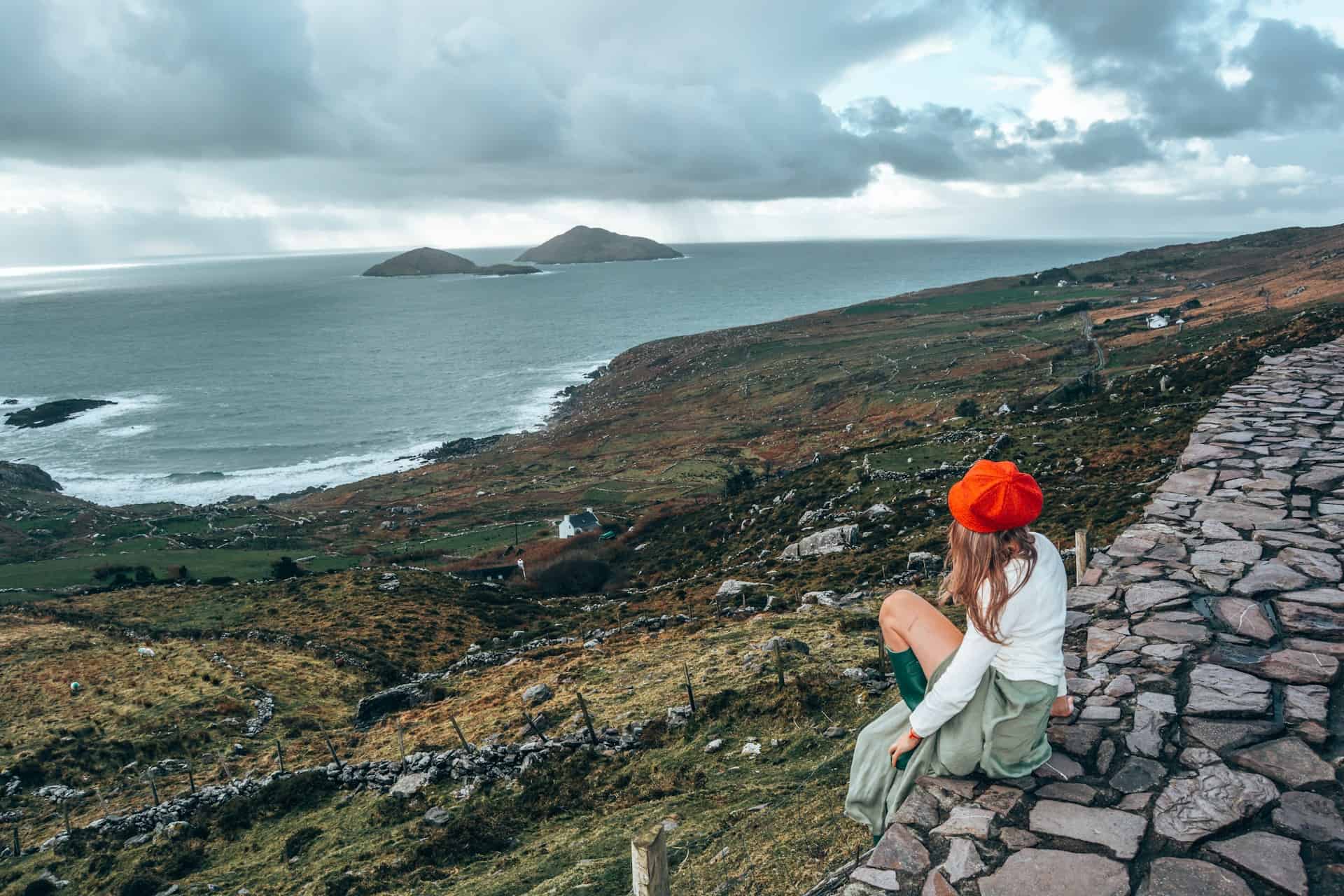 A woman looking out over the Irish coast (photo by Dannii Coughlan).
