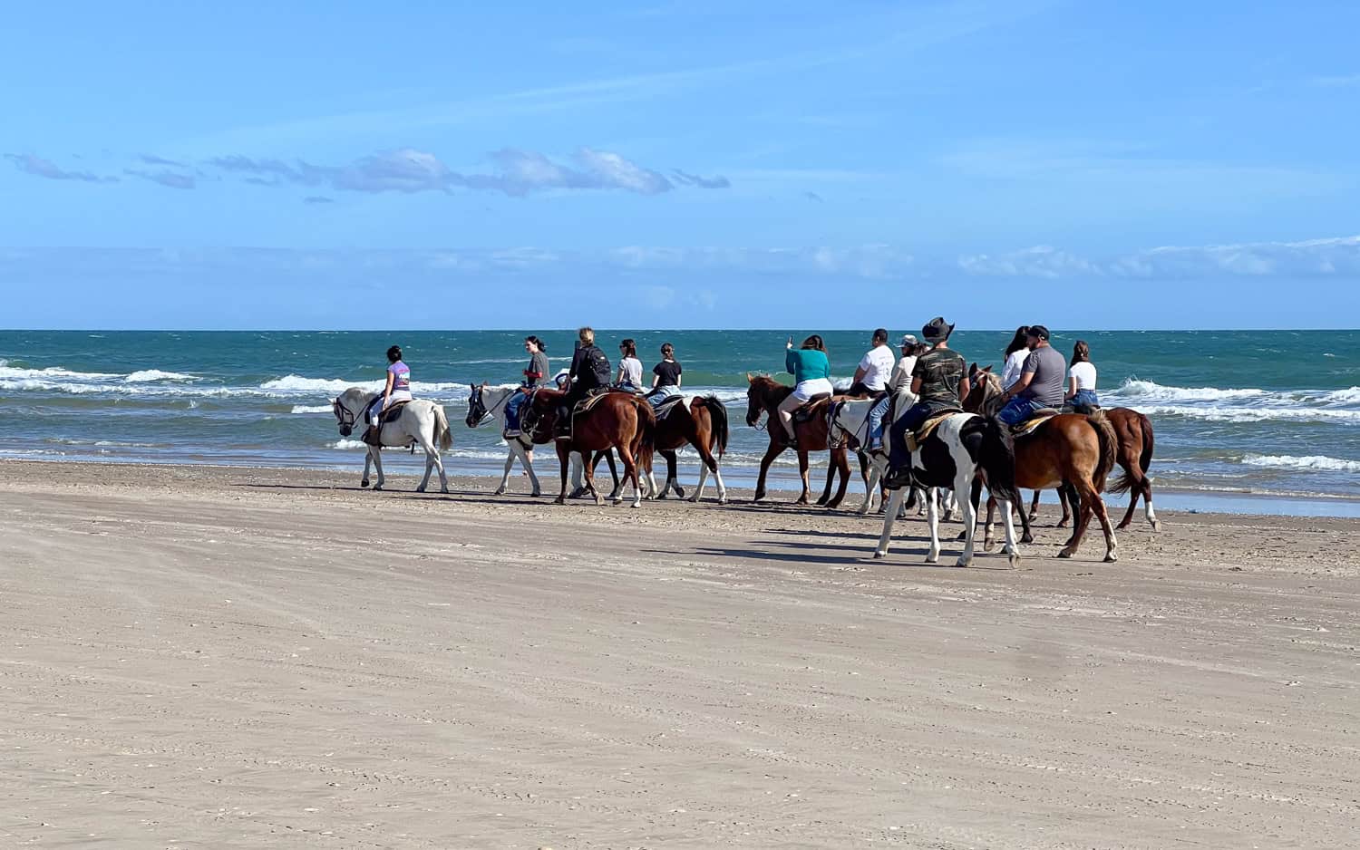 Horseback riding on Sea Shell Beach.