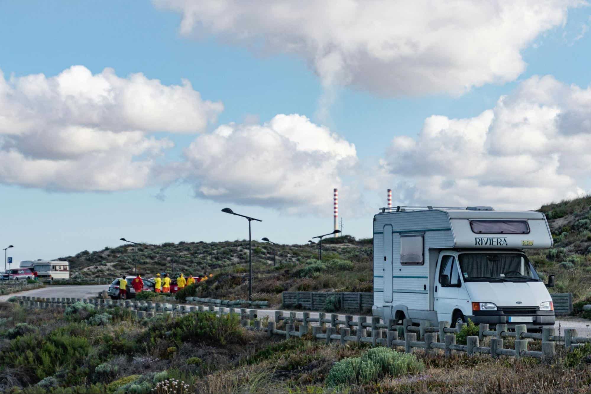 A campervan driving in Iceland.