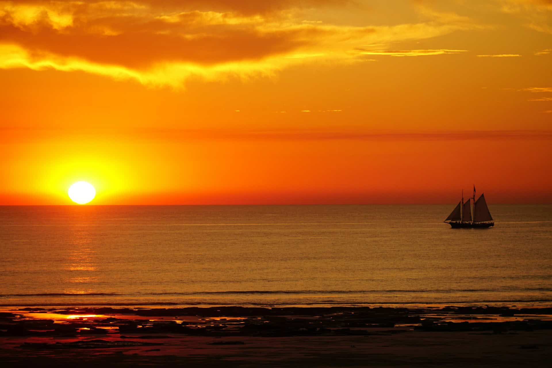Sailboat at sunset, Cable Beach (photo: Sheila C, Unsplash).
