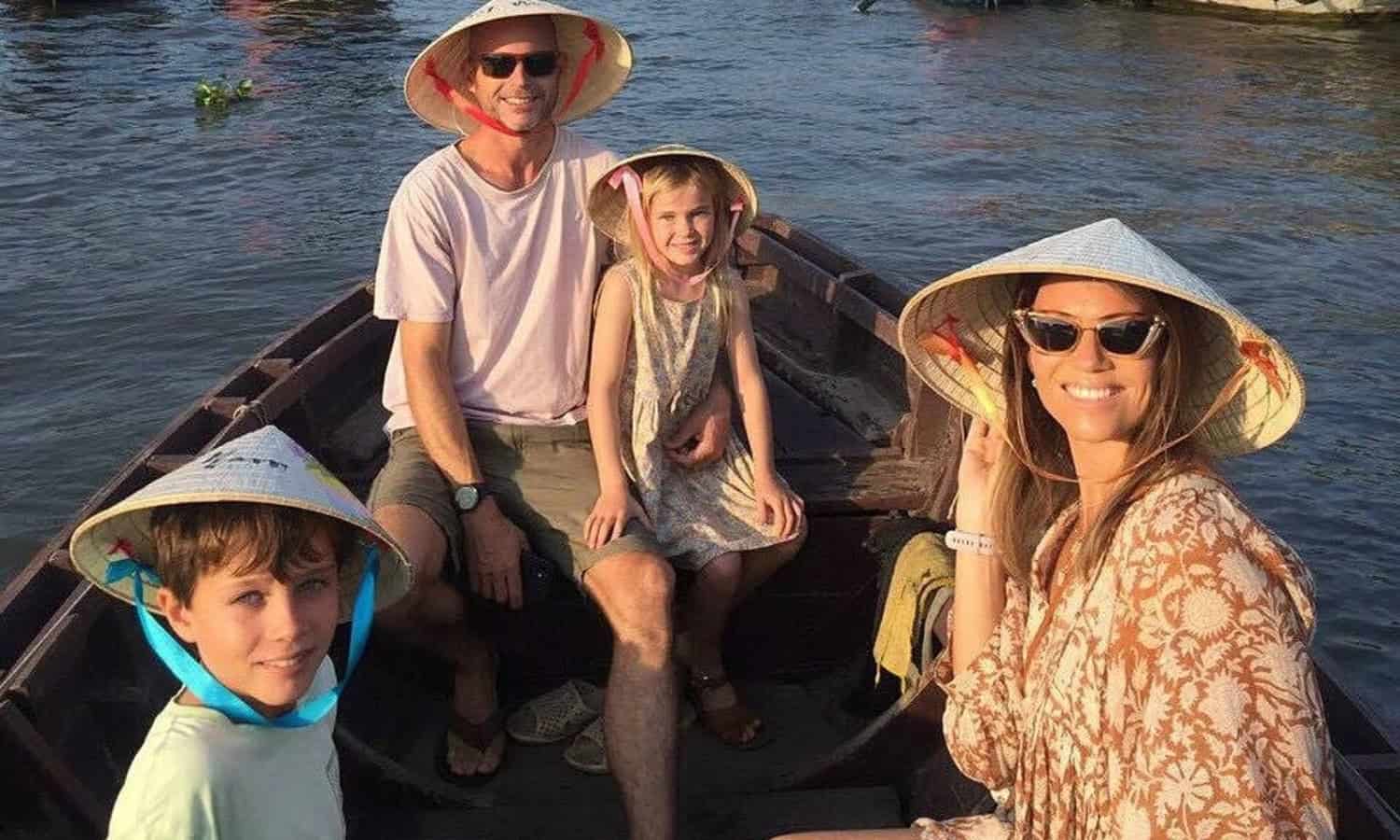 Family on boat tour in Asia